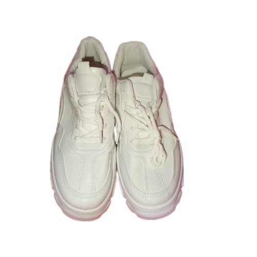 Female sneakers on konga top