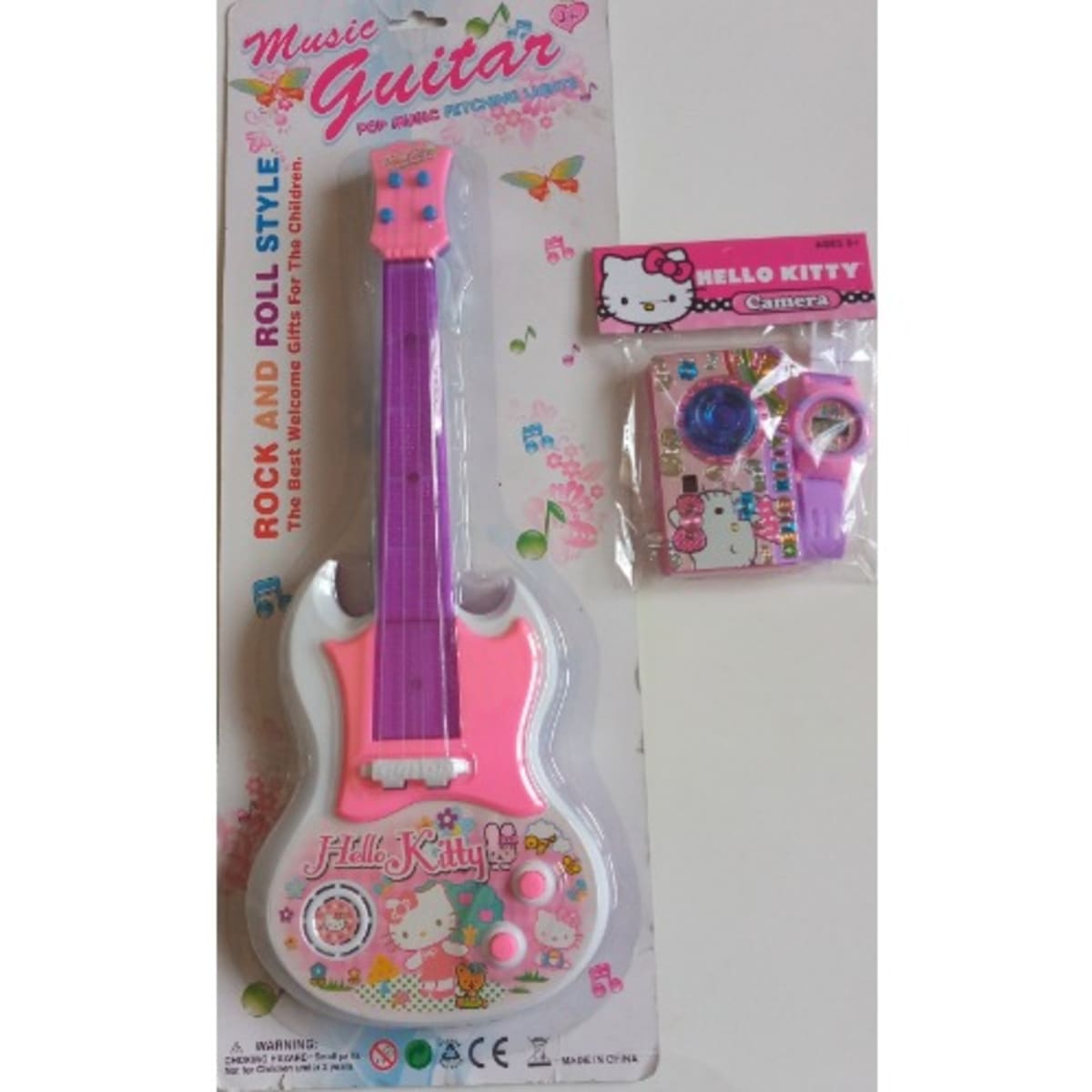 Hello kitty guitar toy sale