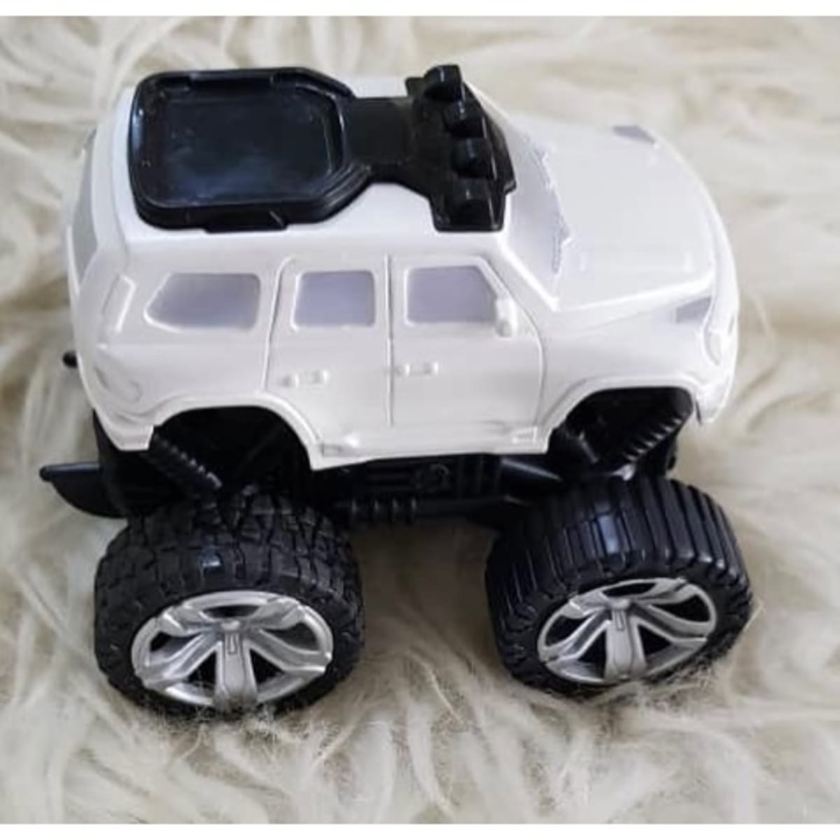 Pull back monster trucks top