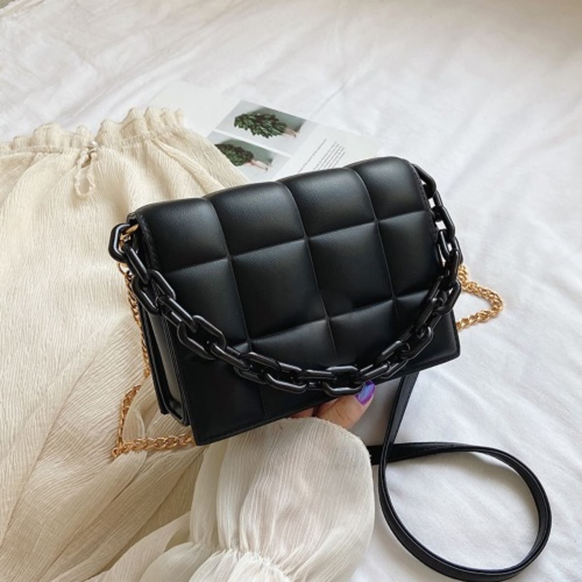 Ladies black top leather handbag
