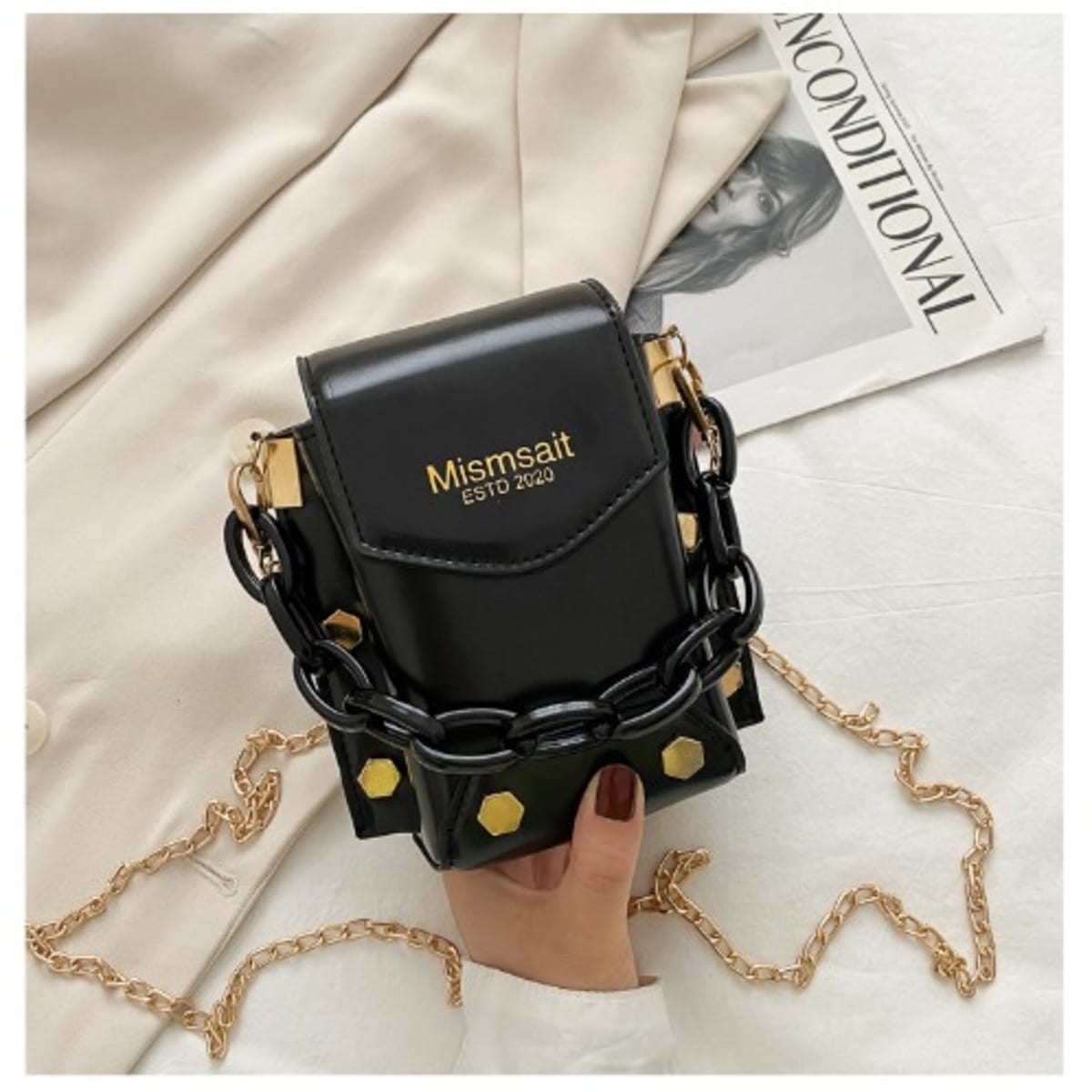Black sling bag hotsell with metal chain