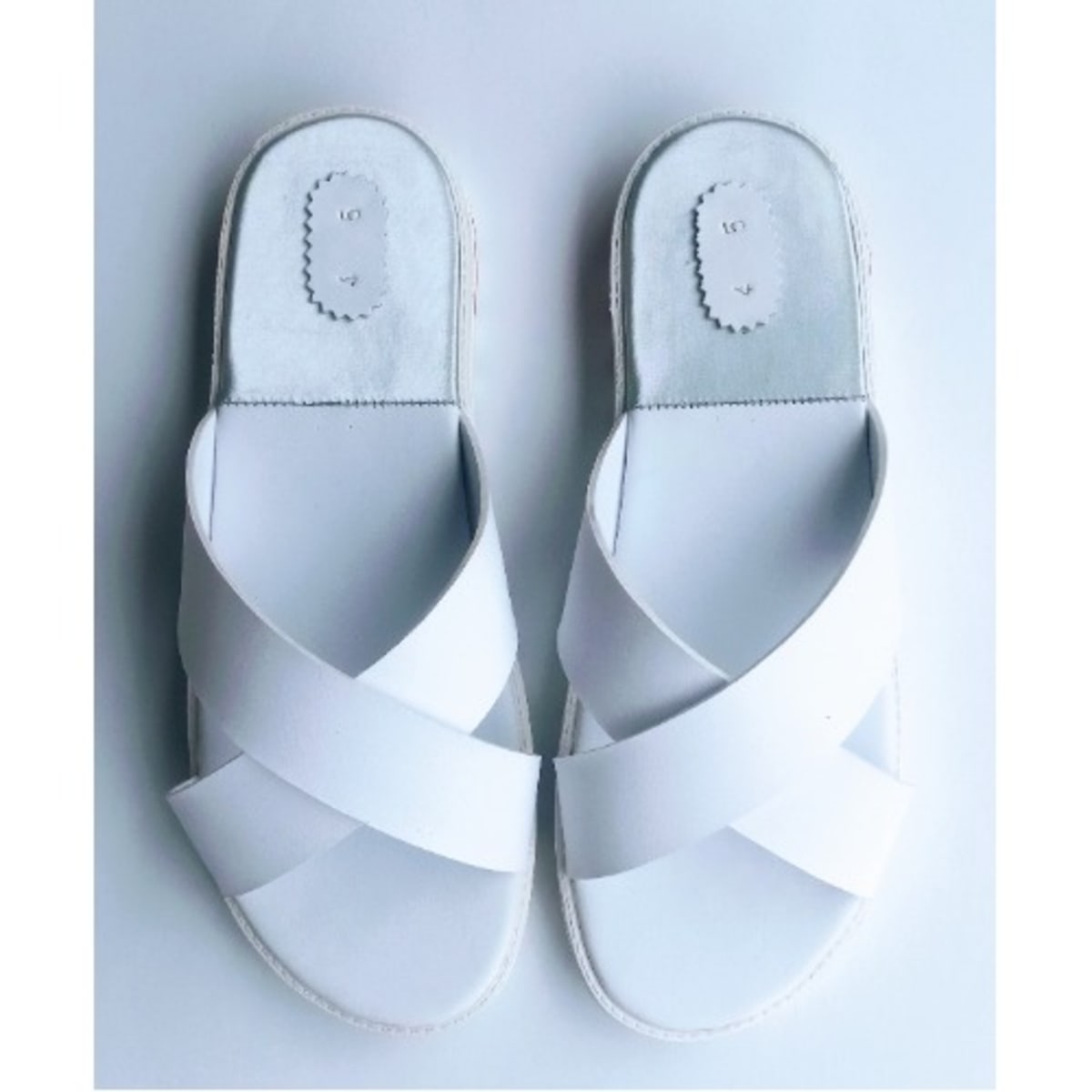 White cross on sale slippers
