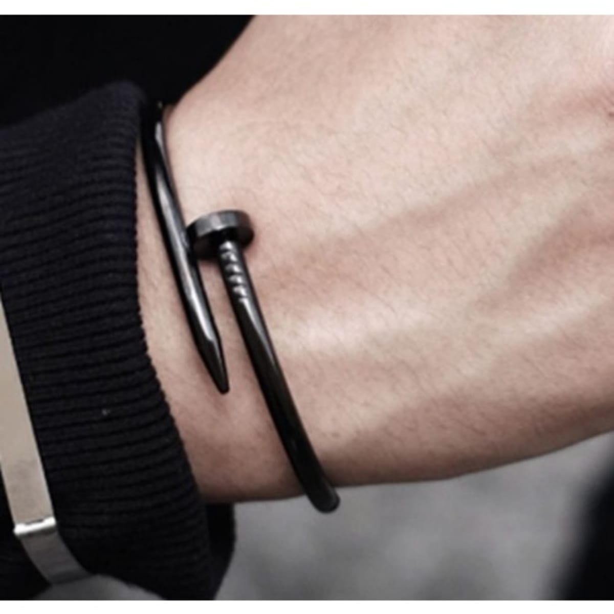 Mens bracelet with nail shaped end -