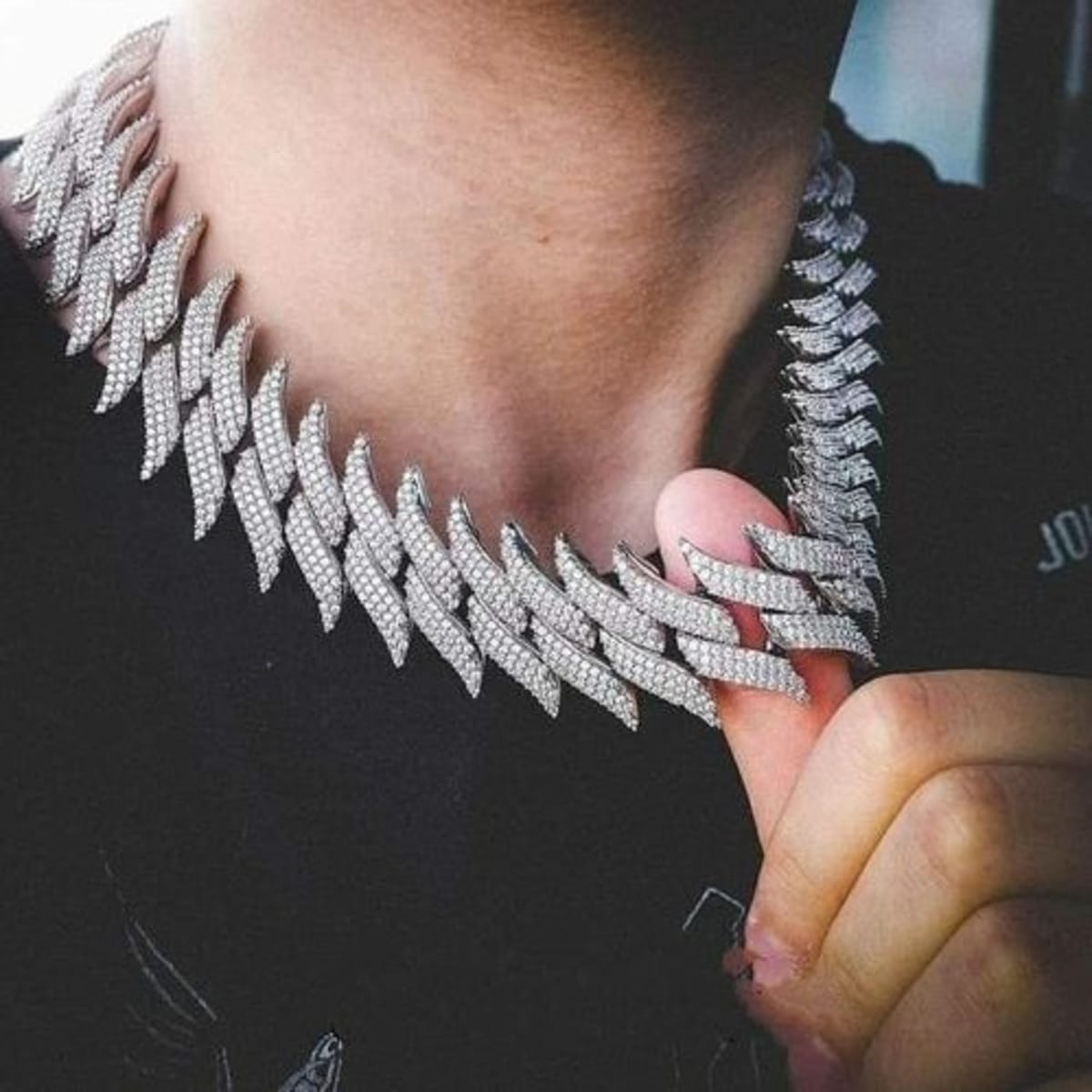 Iced out spike best sale chain