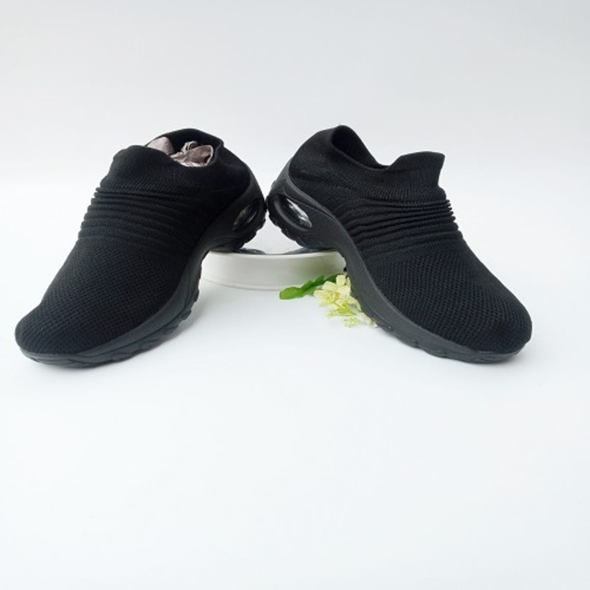 Black sneakers store