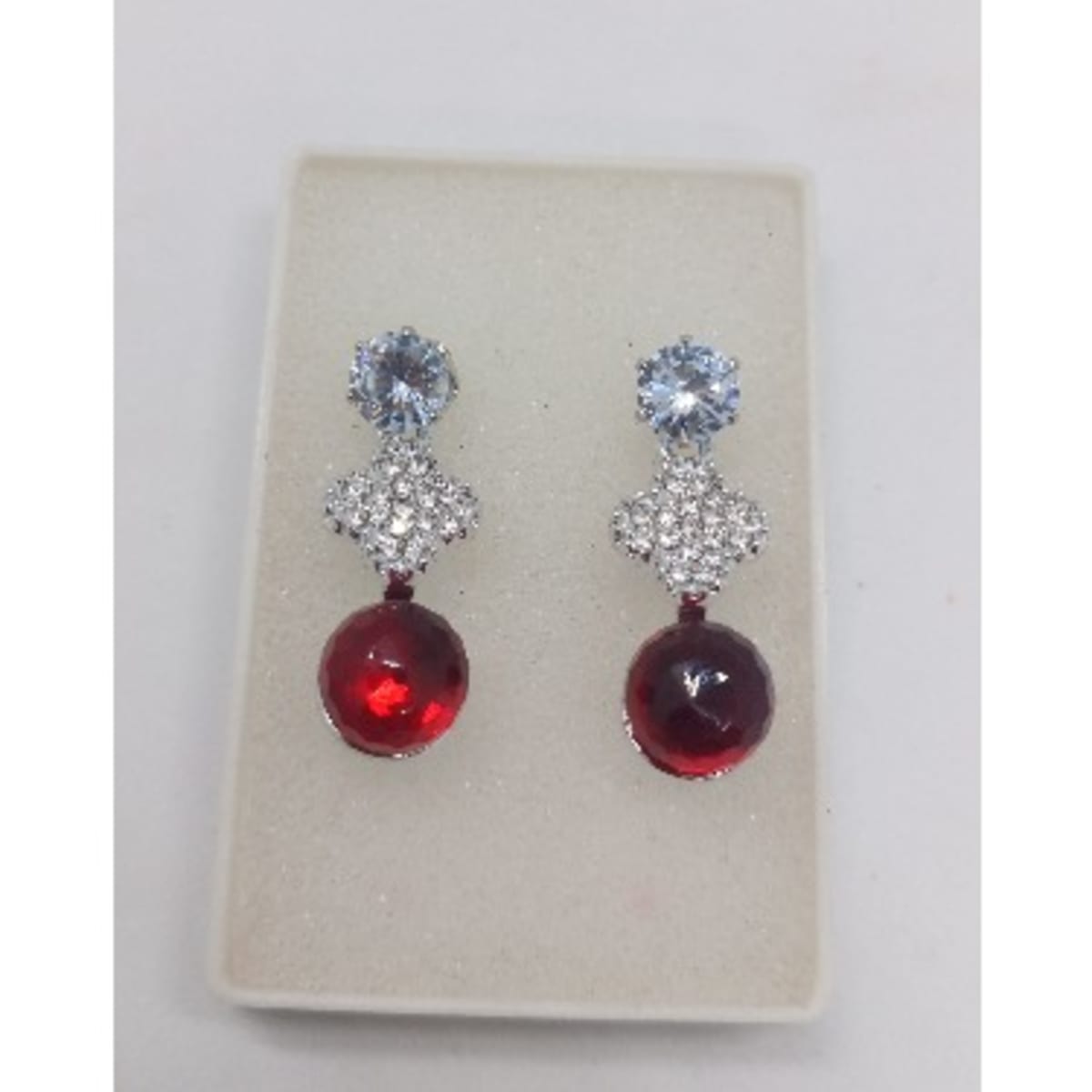 Red ball sales drop earrings