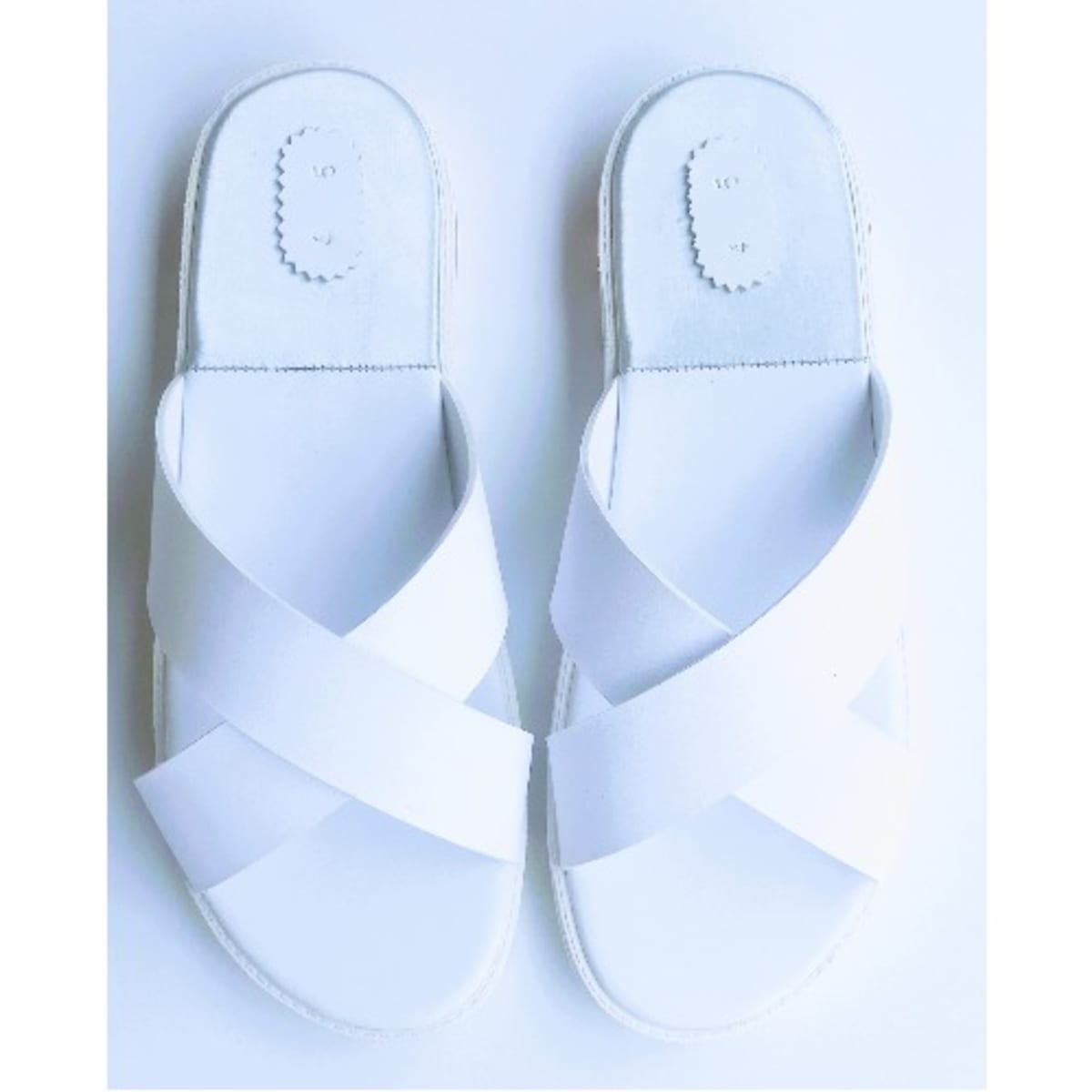 White criss cross on sale slippers