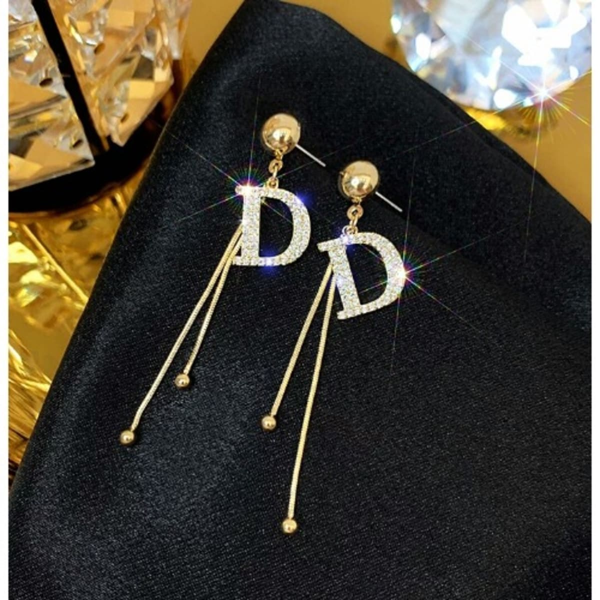 Dangle store letter earrings