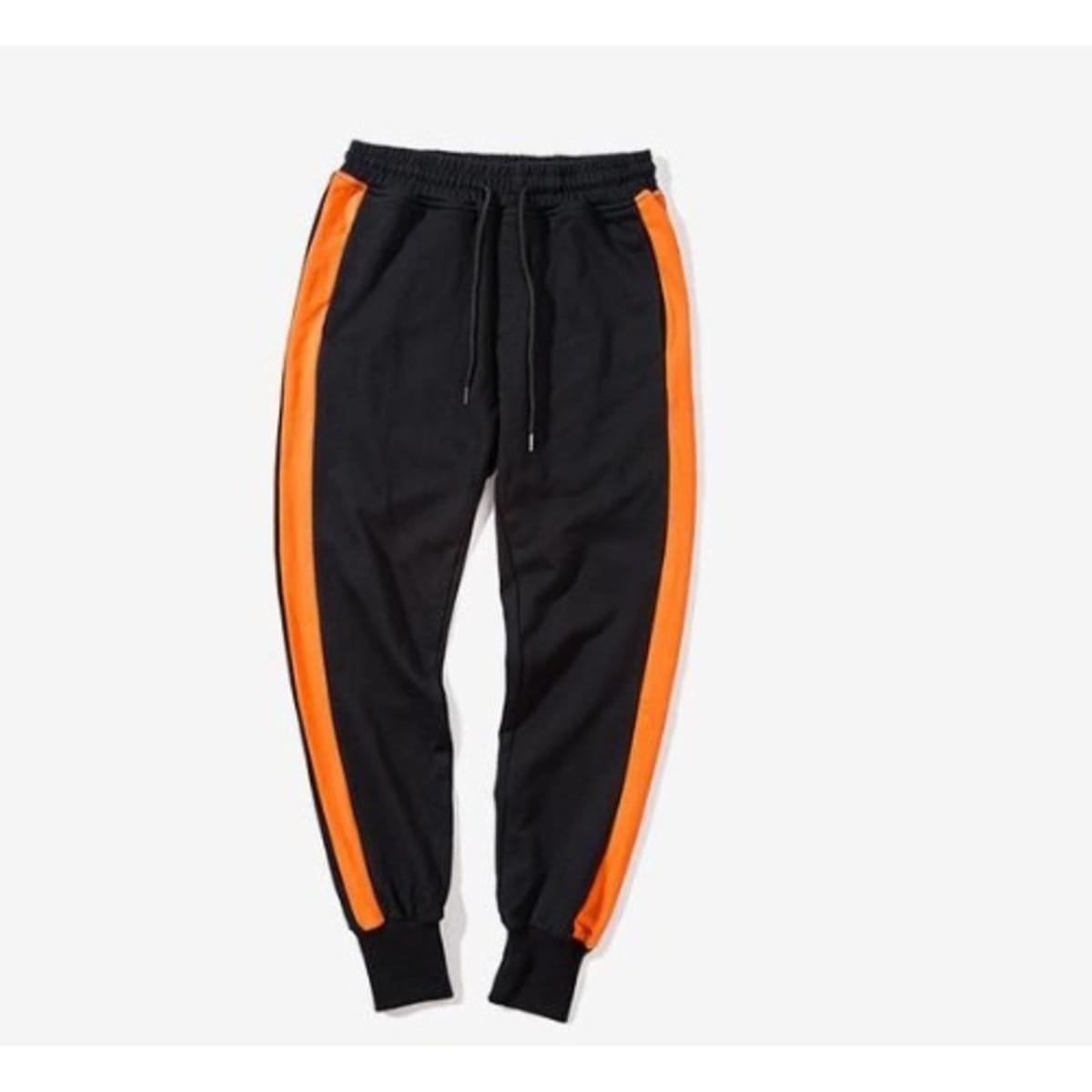 Black joggers with online orange stripe