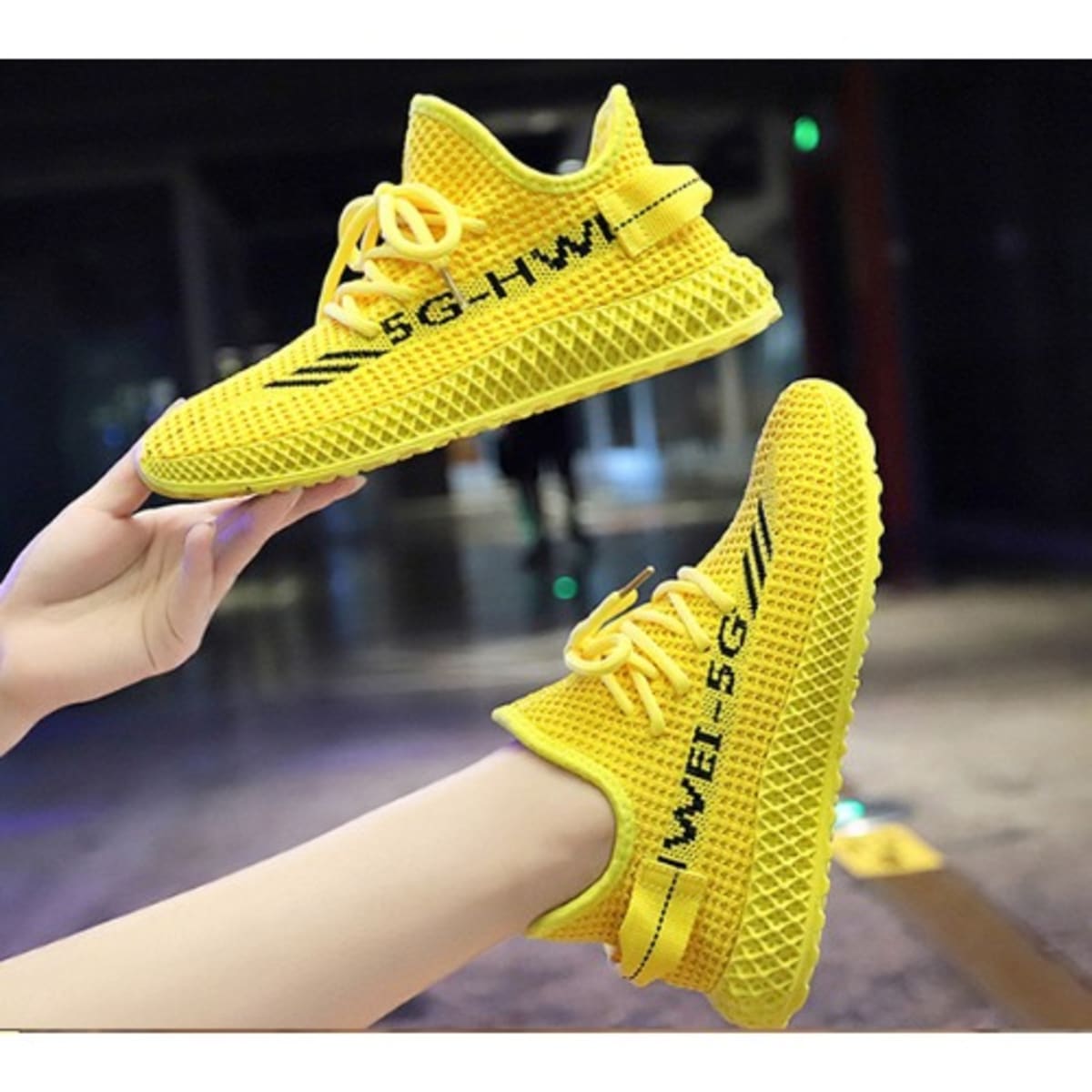 Female sneakers on konga top