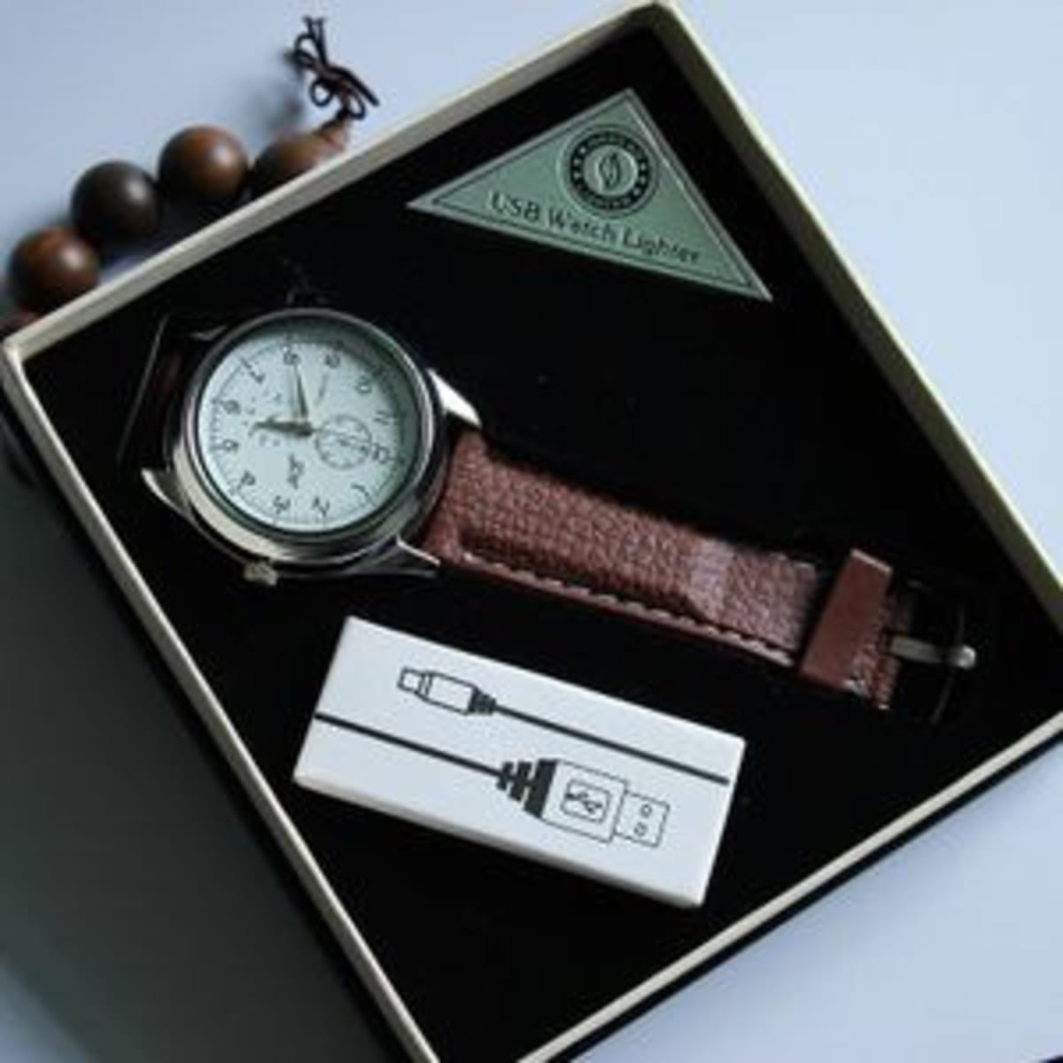 Rechargeable wrist outlet watch