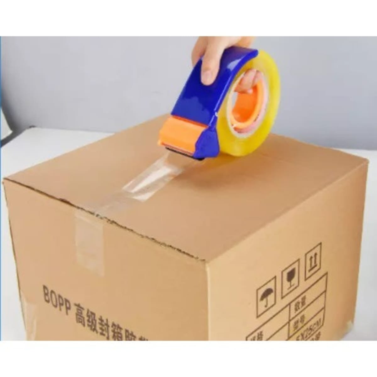 Sellotape outlet and dispenser