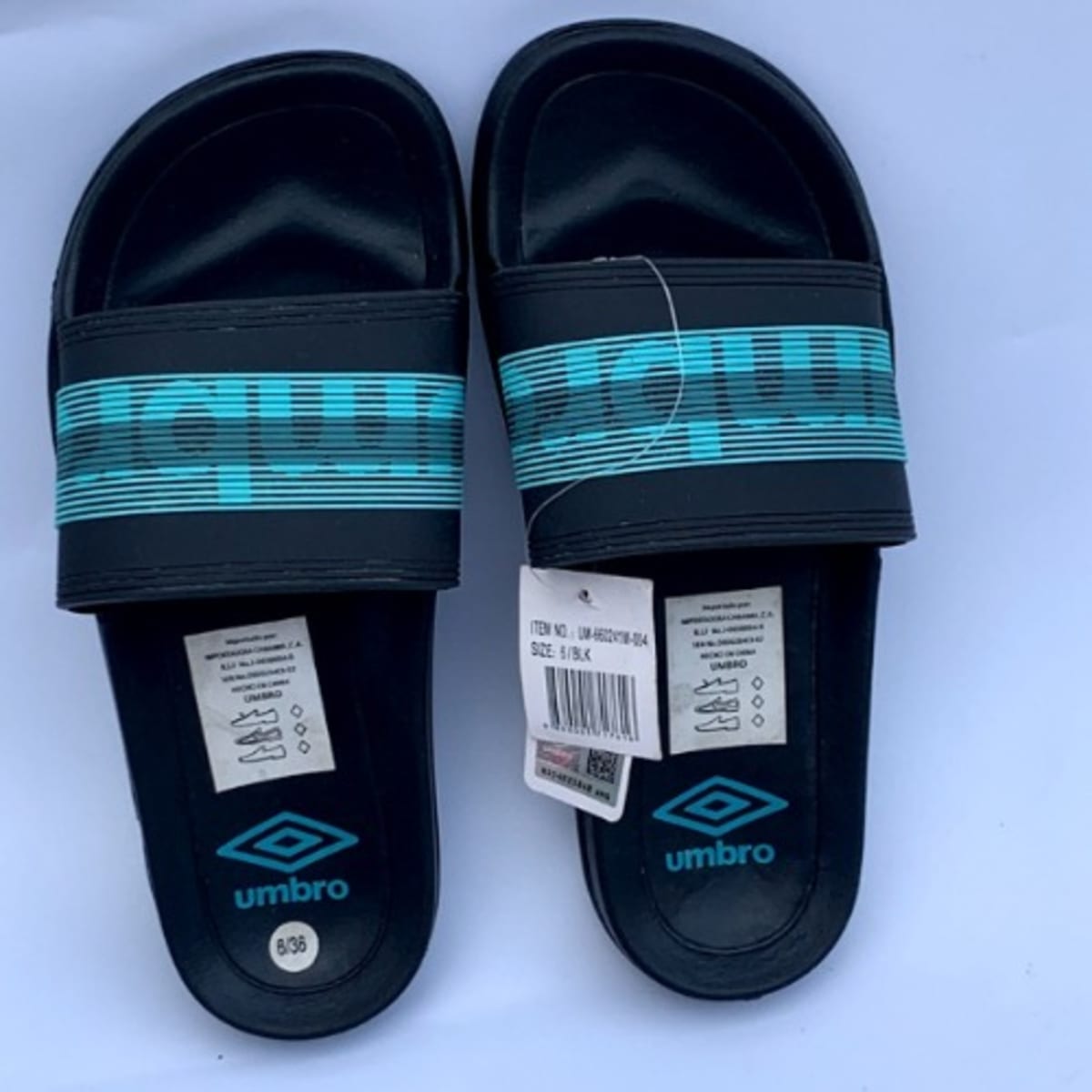 Umbro flip flops discount online