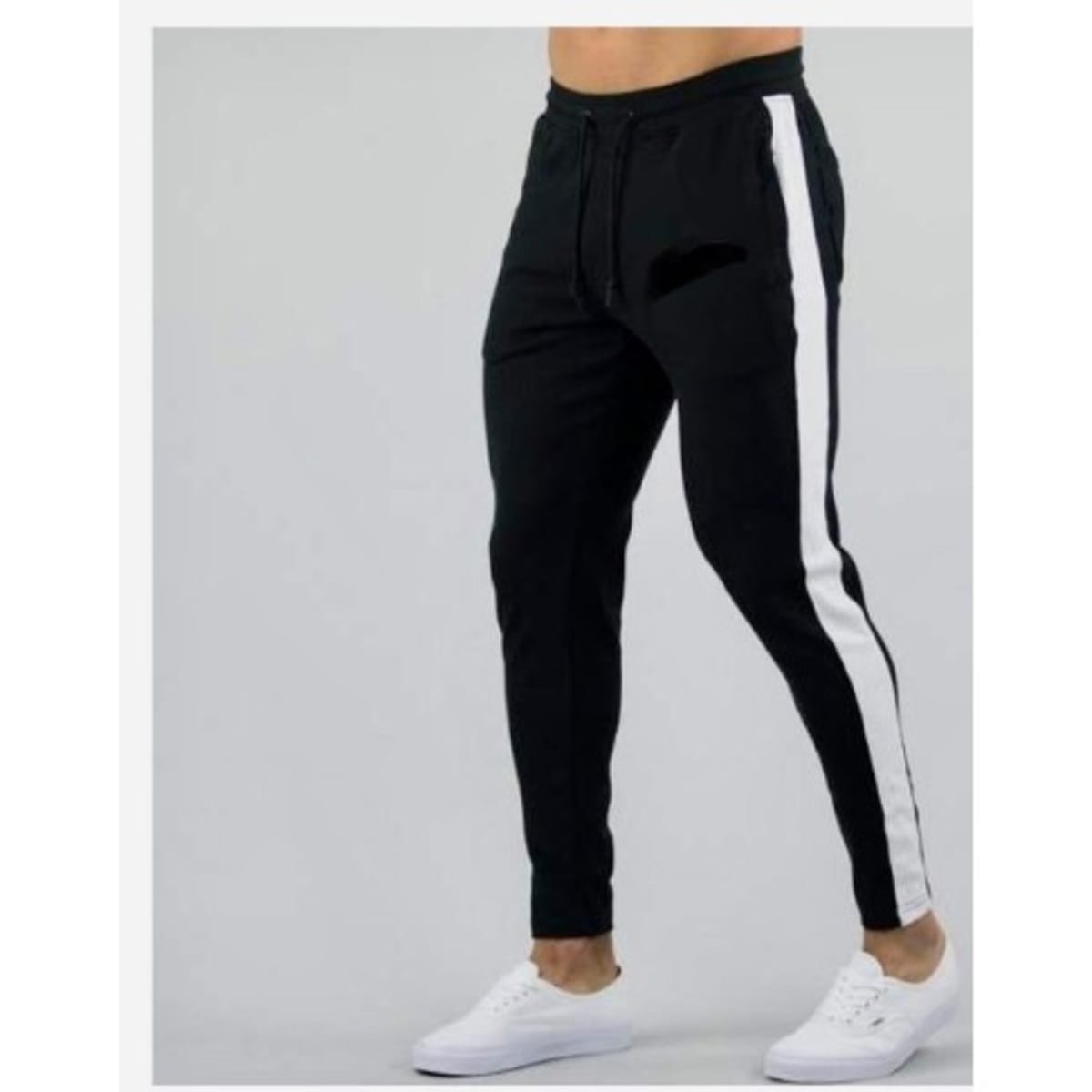 Nike joggers black sale with white stripe