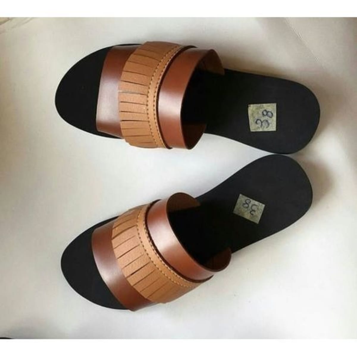 Female palm sale slippers design