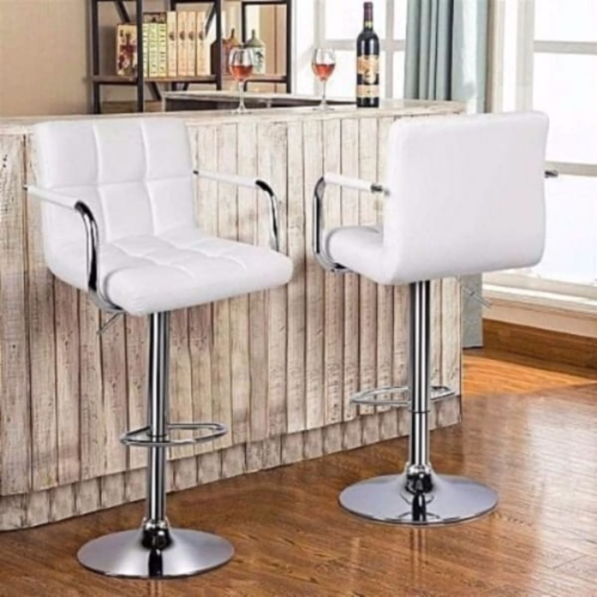 White bar stools with store backs and arms