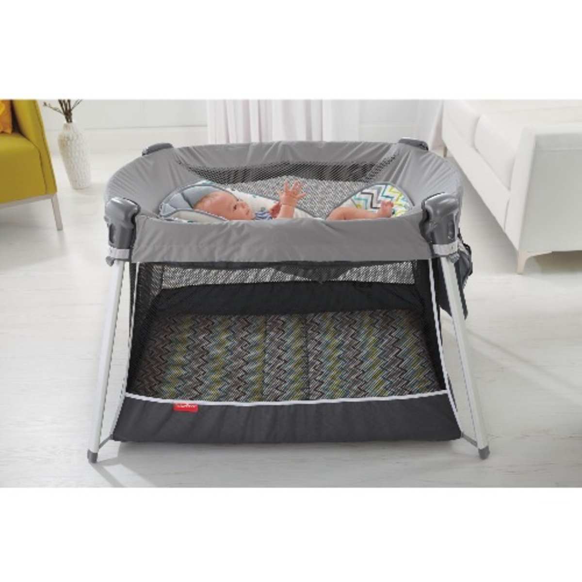 Fisher price ultra lite pack hot sale and play