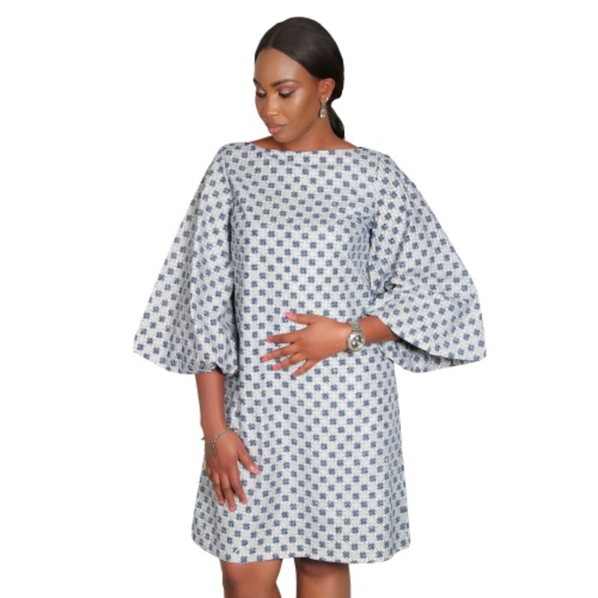 Grey dress shop with bell sleeves