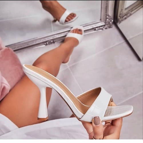 white and red adidas slides