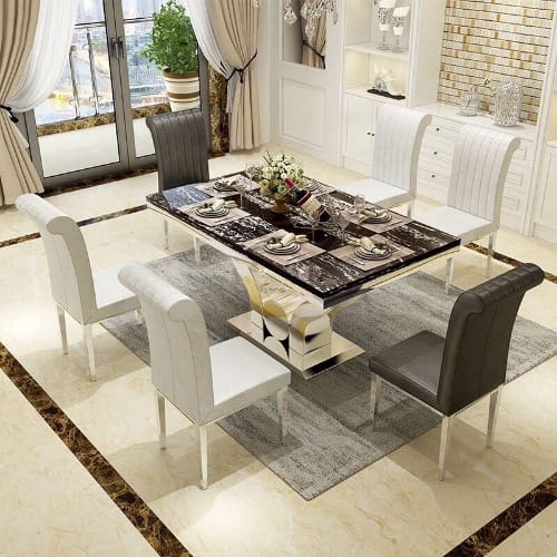 Marble Dining Table With 6 Black Sitting Chairs.