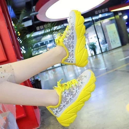 yellow female sneakers