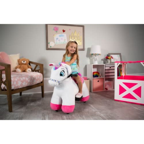 Plush riding sale unicorn