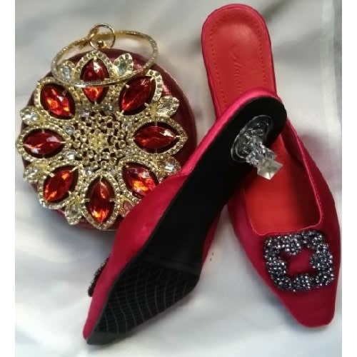 matching red shoes and clutch bag