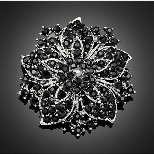 black flower brooch