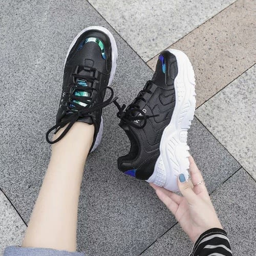 trendy black sneakers
