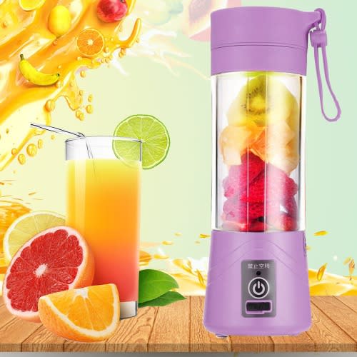 Electric discount fruit juicer
